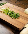 Chopped vegetables on Acacia Wood Cutting Board With Feet 17 By 12 Inches Large Rectangle Heavy Duty Prep Board