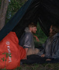 Medium Duty Ripstop Camping Tarp 6 By 8 Feet Waterproof Cover Dark Green 5 Mil Thick With Reinforced Grommets shelter in forest