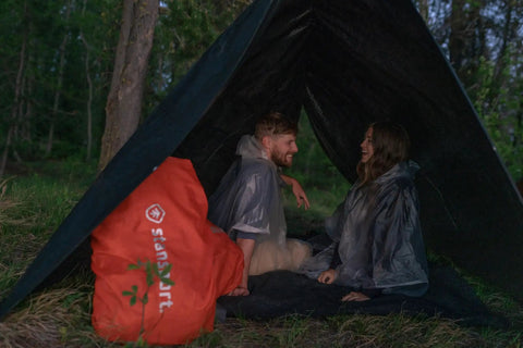 Medium Duty Ripstop Camping Tarp 6 By 8 Feet Waterproof Cover Dark Green 5 Mil Thick With Reinforced Grommets shelter in forest