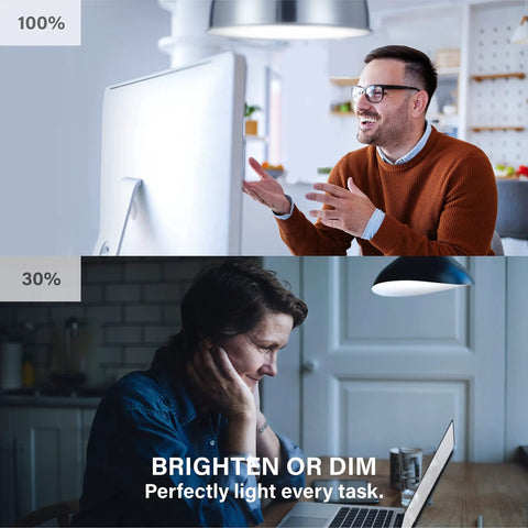 Man in well-lit room and woman in dimmed room using computers, demonstrating Alexa Compatible A19 LED Bulbs 60W Equivalent 800 Lumens Daylight 5000K.