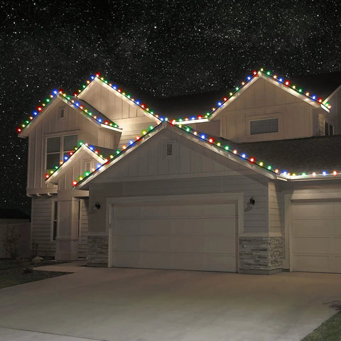 House decorated with Pink C7 Faceted LED Christmas Lights Set Of 25 For Indoor Outdoor Use Dimmable Warm Pink Glow Weatherproof Durable