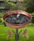 40 Inch Metal Bird Bath With Removable 13 Inch Diameter Bowl And 3 Inch Deep Reservoir, in a garden setting with water fountain