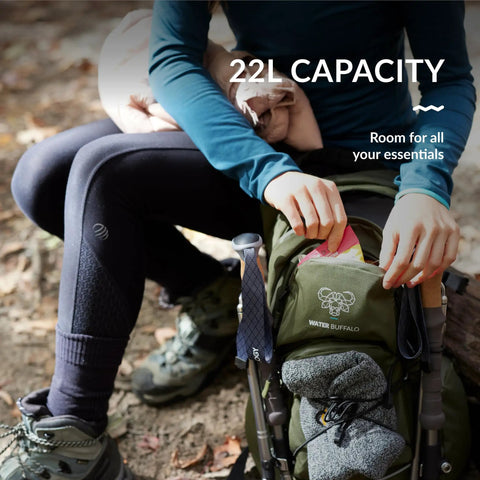 Person using 22L Hiking Hydration Backpack With Leakproof Water Bladder, Phone Pocket, Weatherproof Zippers in outdoor setting