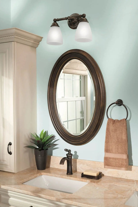 Brantford Collection Traditional Single Post Bathroom Hand Towel Ring in Oil-Rubbed Bronze Finish beside sink