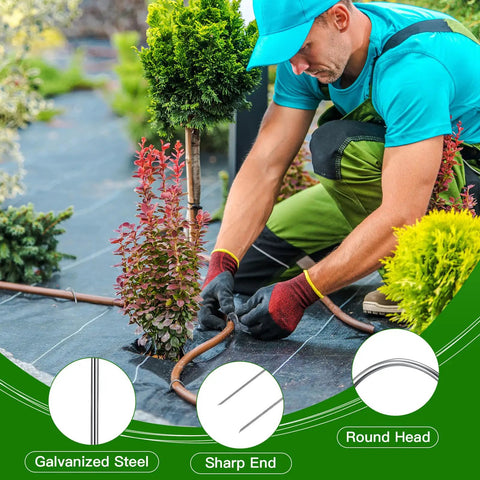 100 Pack Drip Irrigation Tubing Stakes Six Inch Garden Pins securing hose over weed barrier fabric in garden setup