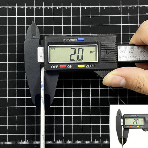 2mm LCD Repair Tape Kit With Tweezers For Screens showing 2mm tape measured by calipers on black grid background
