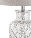 Close-up of Alvord Mercury Silver Quatrefoil Glass Table Lamp base with grey linen shade showing texture and silver finish