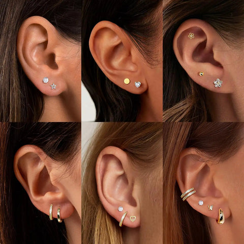 Gold Stud And Hoop Earring Set For Women With Eight Pairs Of Studs And Two Pairs Of Hoops, 14K Gold Plated CZ, Hypoallergenic Jewelry Gift, Dainty Flower And Heart Designs For Everyday Wear Or Night Out; close-up on ear