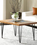 Hairpin Metal Table Legs 20 Inch Set of 4 With Black Screws And Adjustable Cushion Floor Protectors For DIY Furniture Coffee Table Bench Dining End Table Industrial Mid Century Modern Style supporting a wooden table top in living room.