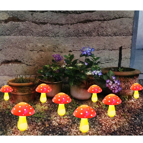 Image of 8 Pack Red Mushroom Solar Lights For Outdoor Garden Decor With 8 Lighting Modes, festive vibe in garden setting