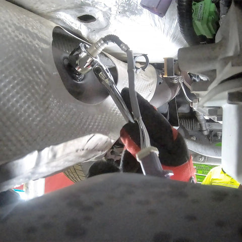 Technician using Seven Eighths Inch Oxygen Sensor Wrench For Ford 4.6L And 5.4L Engines Swivel Head Socket in tight space