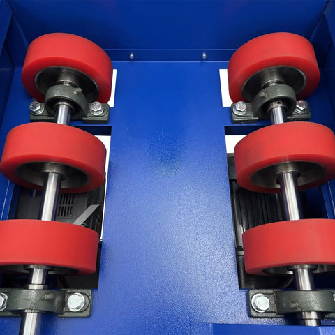 Heavy Hitter 110 Volt Electric Drum Rotator Mixer showing red rubber rollers and metal components for industrial barrel use.