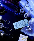 Mini Disco Ball Keychains Set With Organza Bags And Thank You Tags For Graduation Party Favors 36 Piece Bundle displayed on table
