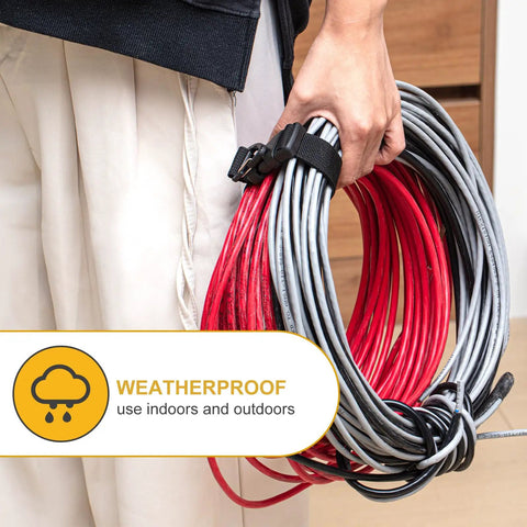 Person holding coiled cables secured with Six Pack 17 Inch Adjustable Extension Cord Holder Organizer With Triangle Clips For Garage Organization And Storage Heavy Duty Cord Hanger For Workshop Black