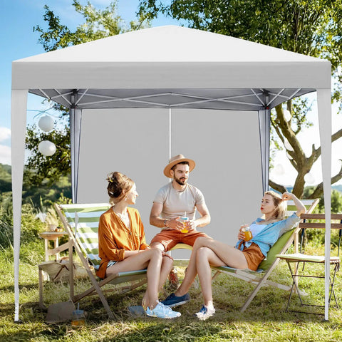 Easy Setup 10x10 Pop Up Canopy Tent With Sidewalls For Outdoor Parties Quick Takedown Gazebo Shelter Durable Patio Event Tent For Backyard BBQs And Get Togethers Adjustable Height And No Tools Needed providing shade in a garden setting with people seated underneath
