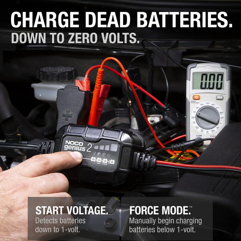 Top Shelf Smart Battery Charger And Hassle Free Trickle Maintainer Delivering Two Amps Of Straight Power For Six Volt And Twelve Volt Flooded Gel Agm Or Lithium Batteries connected to a vehicle battery.