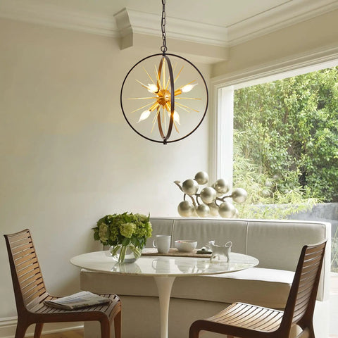 Modern Sputnik Style 6 Light Starburst Chandelier, 18-Inch Globe Fixture In Black And Gold, dining room setting.