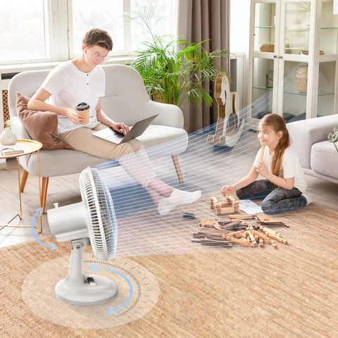 Oscillating Table Fan With Quiet Operation, 12 Inch Size, Three Speed Settings, Adjustable Tilt Head, Safety Grill in living room