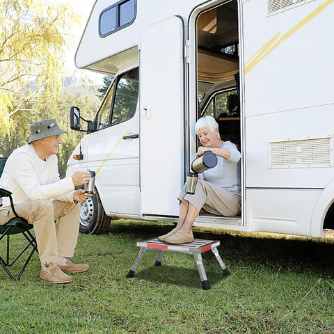 Non Slip Folding RV Steps With Adjustable Height, Lightweight Aluminum Step Stool, 4 Height Settings, Heavy Duty 1000 Pound Capacity, Non Slip Gripper Surface, Easy Stow And Go beside RV door
