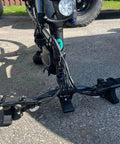 Two Pack Bicycle Maintenance Handlebar Clip On Stand Mount Bracket For Road And Mountain Bikes securing a bike outdoors.