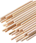 Top Tier 100 Piece 1/8 By 6 Inch Wooden Dowel Rods Smooth Bamboo Craft Sticks Bulk DIY Staple For Cake Decorating And Backyard Bosses Splinter Free Finish arranged in a pile.