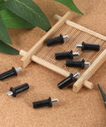 8 Piece Spring Hinge Pins for Cabinet Doors Damper Replacement Pins displayed on wooden surface