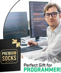 Epic Programmer Socks And Tech Gift For Men, with box and smiling man at computer workstation.