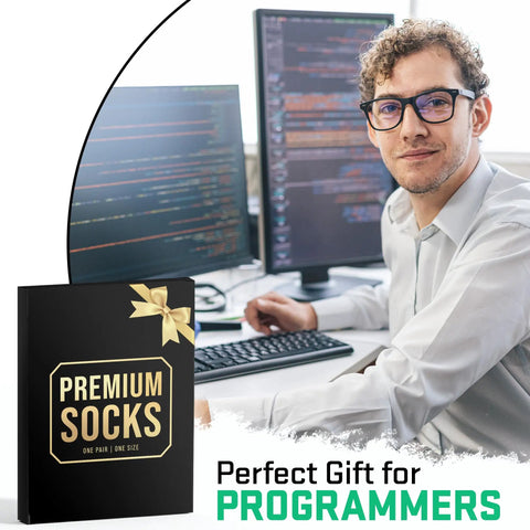 Epic Programmer Socks And Tech Gift For Men, with box and smiling man at computer workstation.