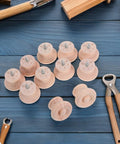 Round Wooden Drawer Knobs Set, 10 Pack, Single Hole Circular Wood Handles on blue background with tools, Natural Solid Wood