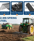 Heavy Duty Tow Behind Landscape Rake And Lawn Dethatcher with 21 steel tines, attached to tractor for soil preparation in field