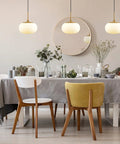 Dining room with Big 12 Inch Opal Glass Pendant Light With Antique Brass Finish For Living Room And Kitchen Island, warm glow.