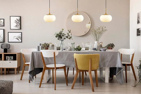 Dining room with Big 12 Inch Opal Glass Pendant Light With Antique Brass Finish For Living Room And Kitchen Island, warm glow.