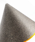 Close-up of Beveling Chamfer Drill Bit for Enlarging Holes in Tile Marble Glass Ceramic Granite focusing on grit texture