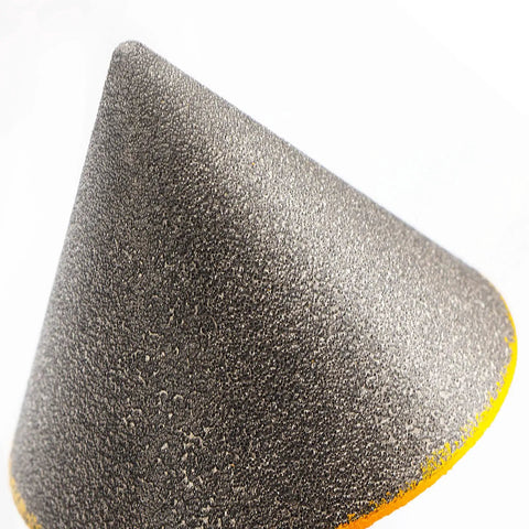 Close-up of Beveling Chamfer Drill Bit for Enlarging Holes in Tile Marble Glass Ceramic Granite focusing on grit texture