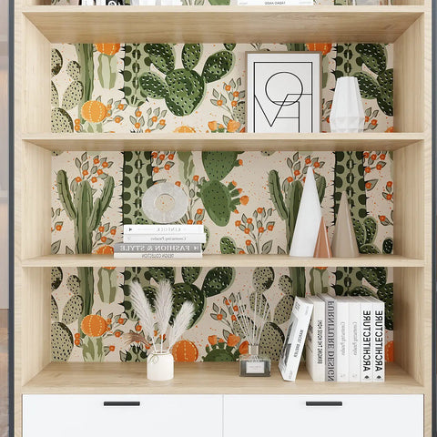 Desert Cactus Wallpaper Peel And Stick Floral Cacti And Succulents Boho Wall Mural on bookshelf, with decor items.