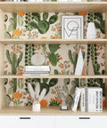 Desert Cactus Peel And Stick Wallpaper Floral Cacti Pattern For Walls Cabinets, visible on a wooden shelf backdrop.