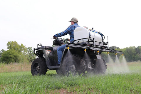 ATV spraying field using Quick Detach Sprayer Nozzle Caps With Gaskets 2 Pack For All Flat Fan Nozzles Leakproof Quick Attach Fit Up To 300 Psi