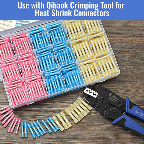 Front view of a clear storage case with pink, blue, and yellow heat-shrink butt connectors and a Qibaok crimp tool.