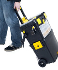 Rolling Tool Chest On Wheels With Drawers And Stackable Compartments For On The Go Jobs being pulled by person