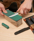 User sharpening a knife from the Solid Spoon Carving Kit With Dang Sharp Hook And Chip Knives delivering knockout sloyd whittling experience.