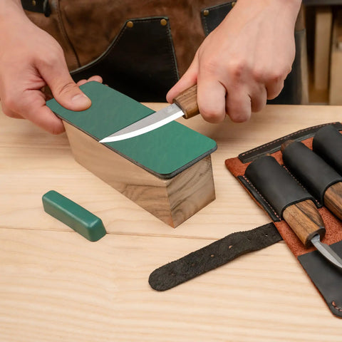 User sharpening a knife from the Solid Spoon Carving Kit With Dang Sharp Hook And Chip Knives delivering knockout sloyd whittling experience.