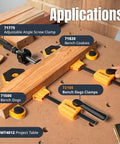 Heavy Duty Bench Dog Clamps For Three Quarter Inch Holes With Quick Release And 176 Pound Clamping Force Rock Solid Woodworking Clamps For Secure Hold On Workbenches 2 Pack shown installed on workbench with wooden board secured.