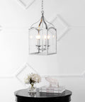 Silver 11 Inch Four Light Traditional Lantern Pendant With Metal Frame And Clear Glass Shade Classic Chandelier For Foyer Or Kitchen Island Energy Saving LED Bulbs Included hanging in room