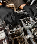 Hella Durable Black Nitrile Safety Gloves With Sick PyraGrip Texture For Superior Traction On Greasy Jobs Heavy Duty Industrial Gear Latex Free Food Safe and Built Tough For Demanding Large Size in use during engine repair.