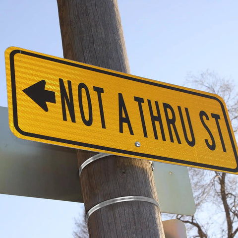 No Drill Beefy Sign Mounting Brackets For Large Poles With Adjustable Street Sign Hardware securing 'Not A Thru St' sign to pole.