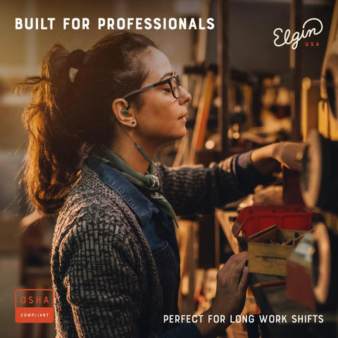Woman wearing Rumble Bluetooth Earplug Earbuds With 27 dB Noise Reduction, IP67 Waterproof, in a workshop setting.