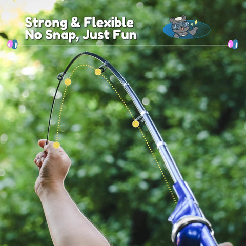 Hands holding extended All In One Kid Friendly Fishing Pole Set With Portable Folding Rod And Spincast Reel against green backdrop