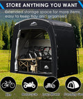 Bike Storage Tent Outdoor Portable Shed For 2 To 4 Bikes And More Large 90 By 33 By 75 Inch Space Built With 210D Oxford Cloth And PU4000mm Waterproof Fabric showcasing storage of bikes and gear in a natural setting.