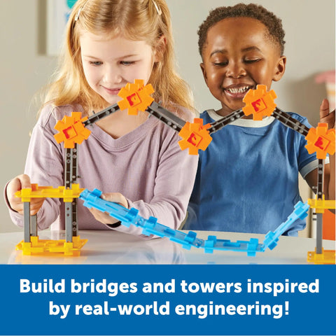 Children playing with STEM Explorers Bridge Builders Classroom Set, constructing colorful suspension bridge model.