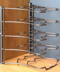 Keep Your Cookware On Deck With This Heavy Duty Pan Organizer Rack Bronze Finish freestanding lid holder metal shelf displayed on countertop.